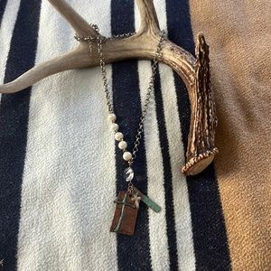 Cross necklace with multiple different design